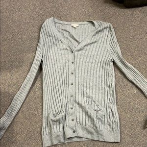 Grey cardigan.